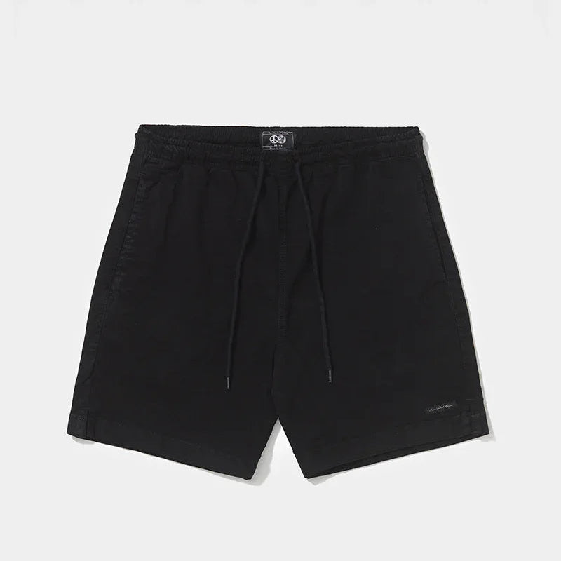 Shorts Spirituality Preto de sarja 100% algodão, com cintura elástica, cordão ajustável e bolsos laterais.